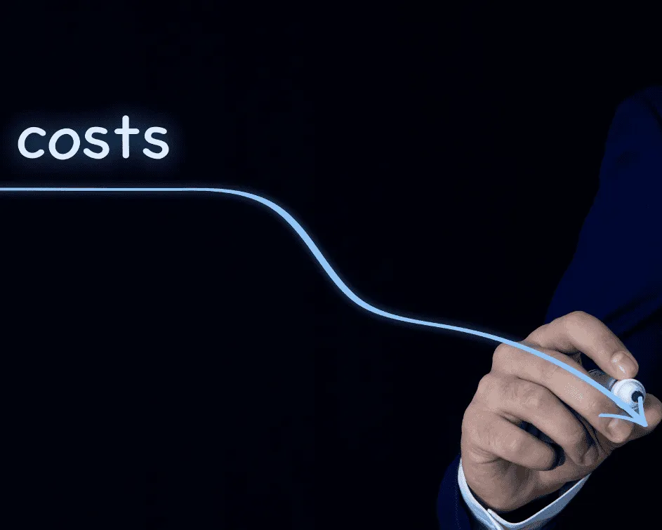 Hand holding a power cord connected to a cost reduction line chart representing IT cost savings and hybrid delivery models