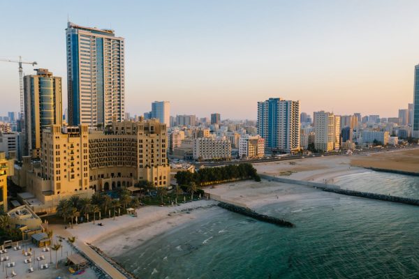 Coastal waterfront skyline representing FiNASAL regional office in Ajman Free Zone, UAE.